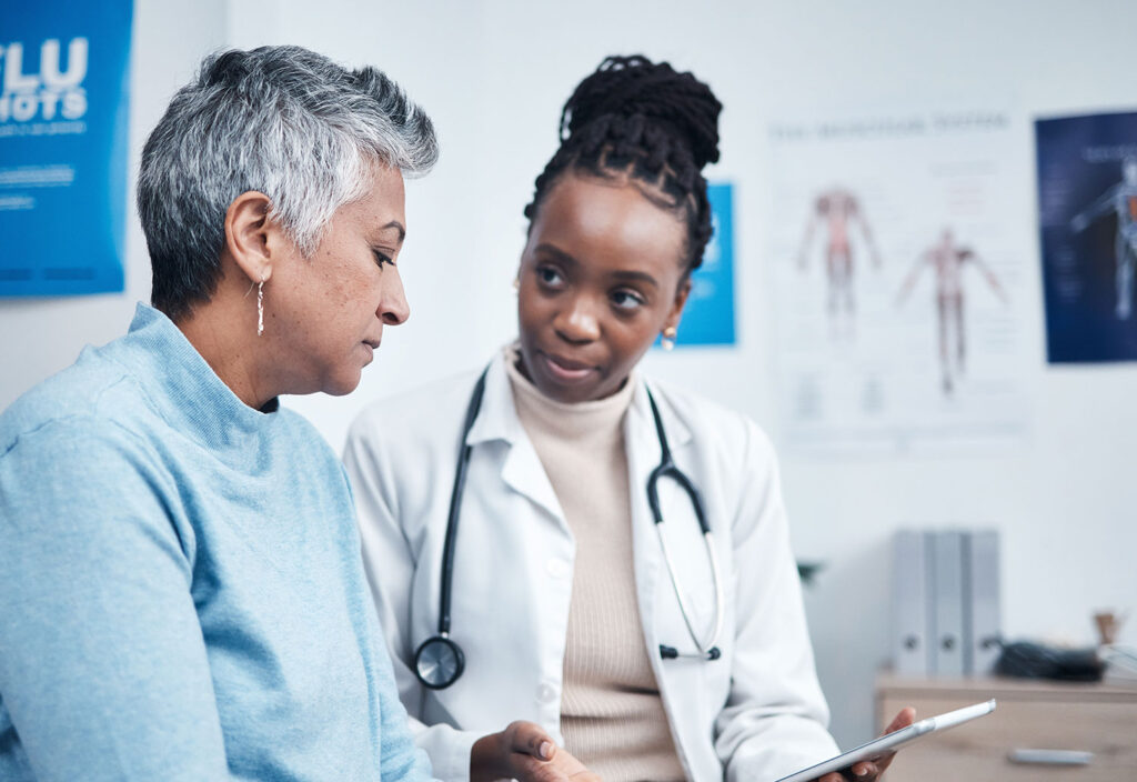 doctor with breast cancer patient